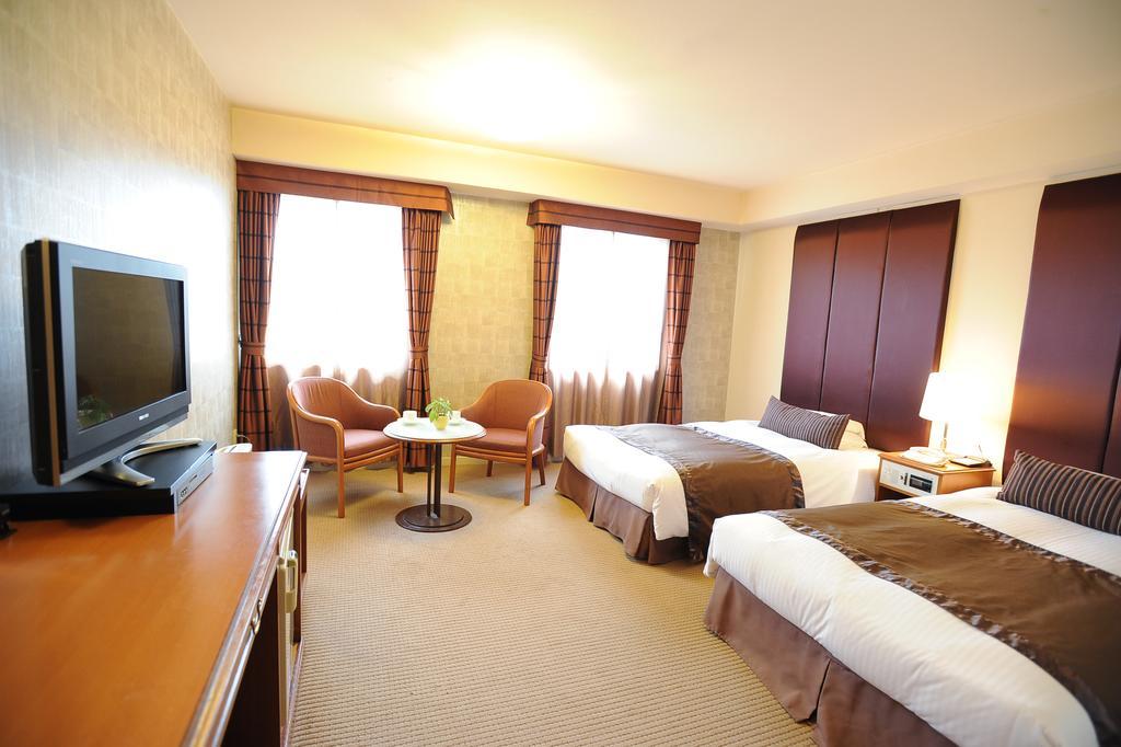 Hotel Yokohama Garden Habitación foto